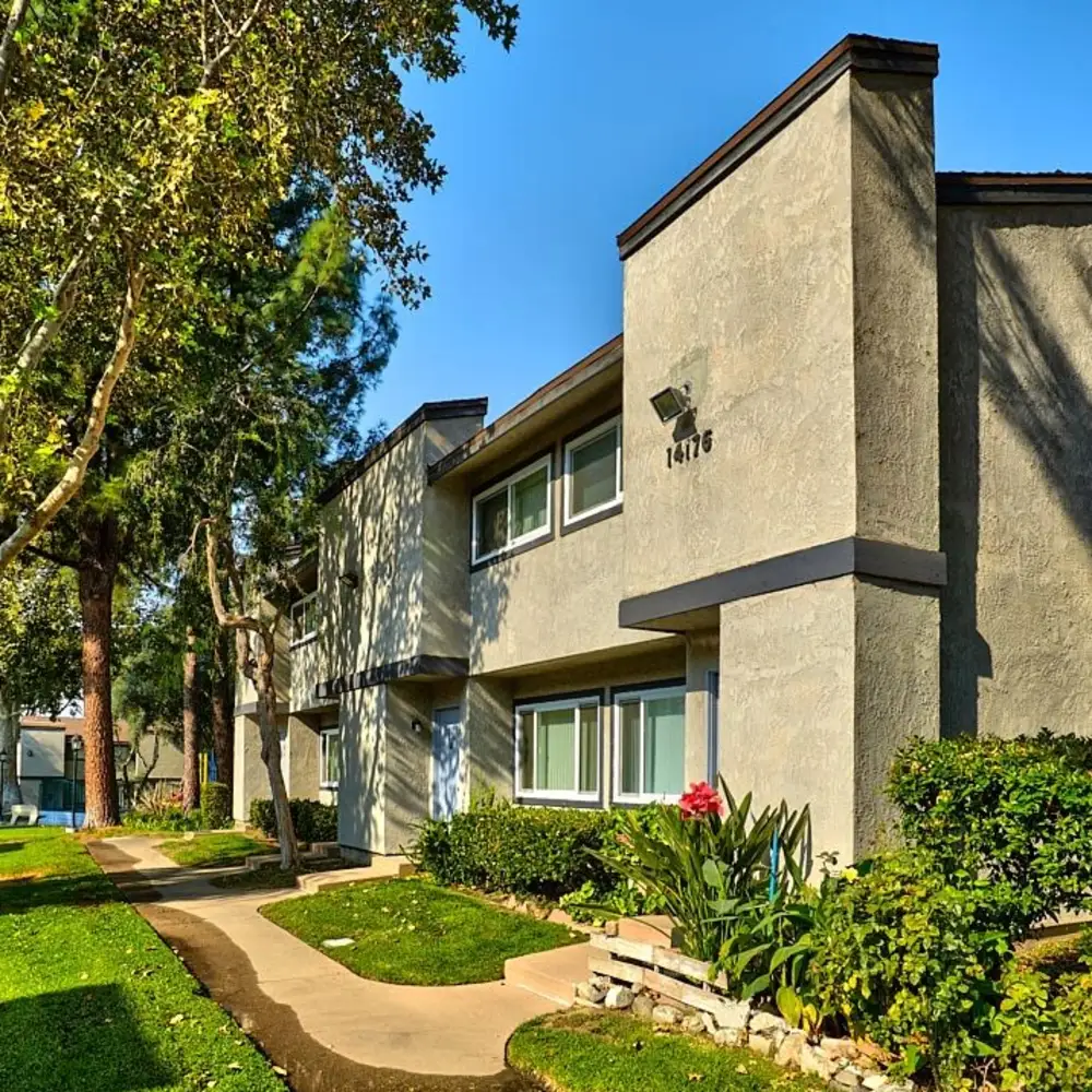 San Diego House Cleaning Service team meticulously cleaning a family room in Bonita, CA, focusing on details for a perfect finish